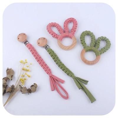 China Beech pacifier holder clip Pure Handmade Cotton Woven Pacifier Chain for sale