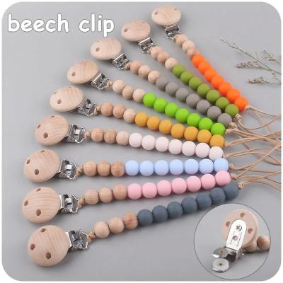 China Safety Multicolor Silicone Pacifier Clips Chain Teething Toys Baby Pacifier for sale