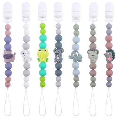 China Colorful Custom Pacifier Chain Clip Cartoon Wooden Dummy Clip Holder en venta