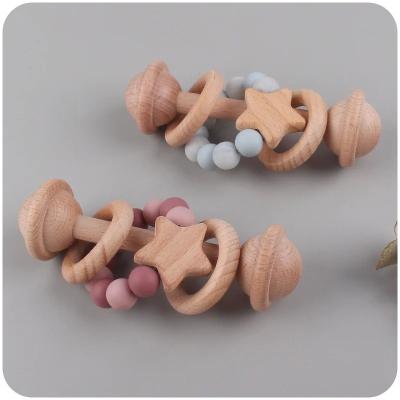 China Beech Wooden Baby Rattle Shake Toy Wood Animal Teether Ring Grasping Teething Toys for sale
