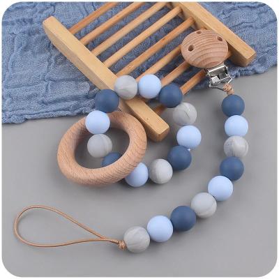 China Natural Babys Teething Toys Wood Teething Bracelets Set Easter Gift Set en venta