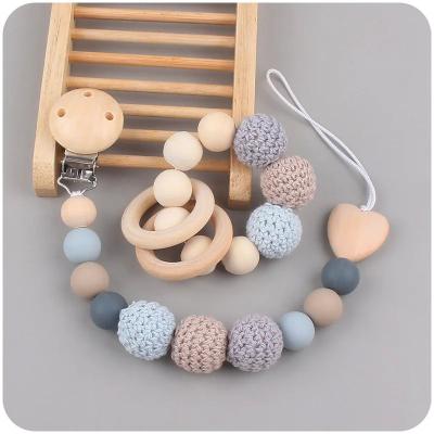 China Safety Infant Teething Toys BPA Free Food Grade Silicone Baby Teether Pacifier Clips Te koop