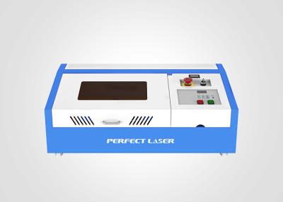 Китай Мини автомат для резки гравировки лазера СО2 50в/40в, настольный лазерный гравер продается