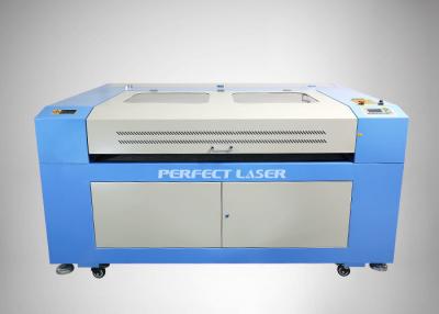 China Máquina de corte a laser industrial CNC de cabeça dupla 100 W Interface USB para couro/borracha à venda