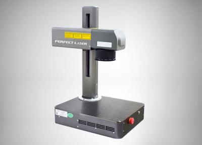China Small Volume Metal Mini Fiber Laser Marking Machine Fast Speed Tabletop 30-60khz for sale