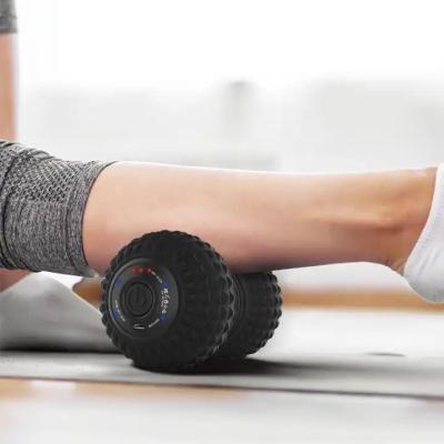 China Fitness Alivio muscular Vibrante Masaje corporal Roller Fisioterapia Bolas de masaje de silicona de cacahuete en venta