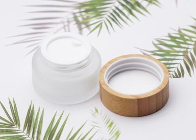 China Cylinder Glass Cosmetic Cream Jar Container With Bamboo Screw Cap 50ml for sale