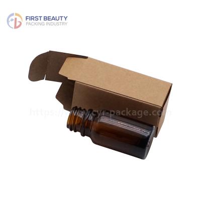 China Round Glass Bottle Amber Essential Oil Bottle for sale