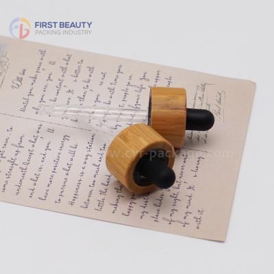 China Renewable 18mm Bamboo Glass Bottle Dropper With Natural Bamboo Color Closure for sale