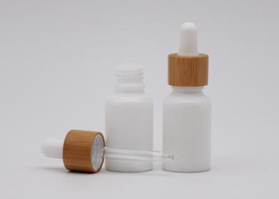China A aromaterapia de vidro branca da porcelana engarrafa 30ml com o conta-gotas branco de bambu à venda