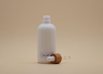 China Cylinder Shape White Glass Dropper Bottles 100ml For Cosmetic Packaging for sale