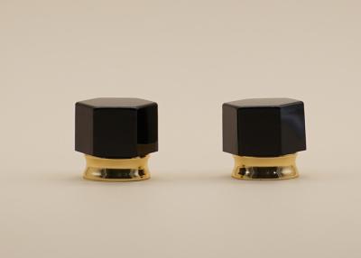 China Nut Shape Black Color Perfume Lid Hexagon Shape With Gold Aluminum Collar for sale
