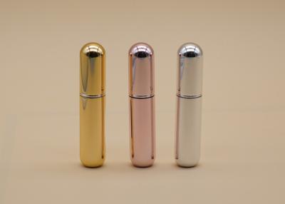 China Plata brillante del rosa del oro del color de perfume del cuidado personal del metal de cristal recargable de la botella en venta