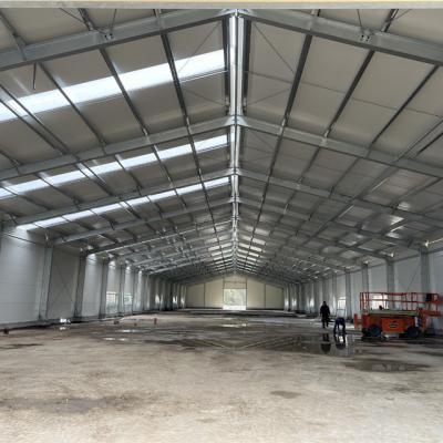 China Q235 Prefabricated Steel Structure Warehouse Building With M20 Anchor Bolt Rockwool Wall Panel for sale