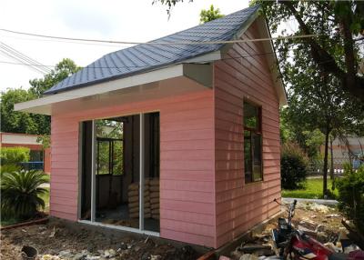 中国 応接室のためのEPSサンドイッチ パネルの屋根のピンクのクラッディングのプレハブの鋼鉄家 販売のため