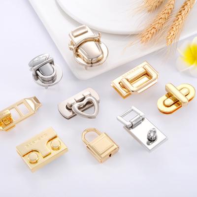 China Alloy Handbag Push Lock Metal Turn Twist Lock for Custom Logo Women Bag Accessories for sale