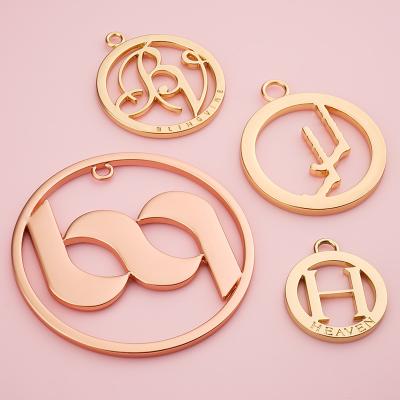 China Metal Logo Design Custom Handbag Tag Eco-friendly Rose Gold Metal Tag for Bag Accessories for sale