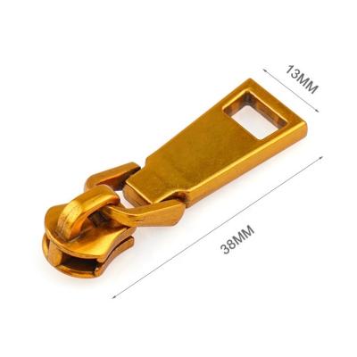 China Sneak Gold Metal Zipper Pull Slider for Clothing Suitcase Zipper Sliders for sale