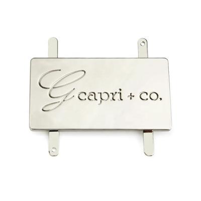 China Customized Size Metal Logo Plate Tags for Handbags Personalized Branding and Design for sale