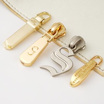 Китай Custom Zipper Pulls For Bags Fashion Design Gold Bag Zipper Puller 3 5 Silver Zip Puller продается