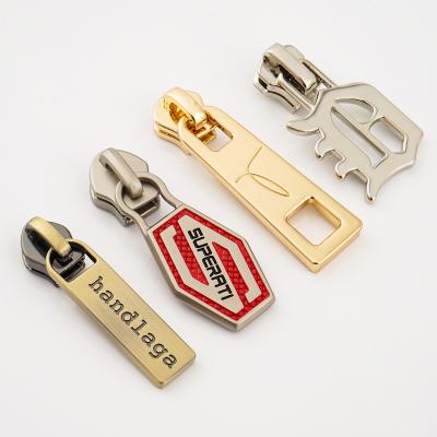 Китай Nickel Free Metal Zipper Sliders For Bags Custom Zipper Puller Clothing Design Logo продается