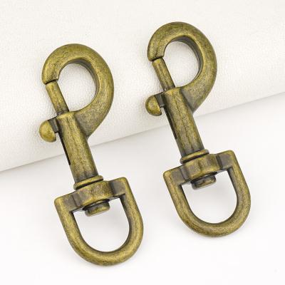中国 Metal Bag Accessories Antique Brass Swivel Snap Hook 11mm Dog Hook with Customized Logo 販売のため