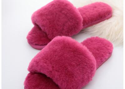 China Wool Lining Womens Fluffy Slippers , Pink Warm Fuzzy Slippers Rubber Sole for sale