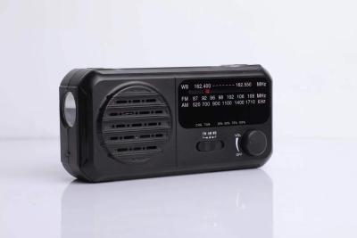 China Portable 3 Band Radio 400g Multi Function Solar Battery Powered Hand Crank Radio for sale