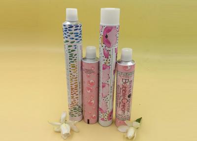 China Tubos cosméticos vazios coloridos com o tampão redondo completo, tubos de alumínio para cosméticos à venda