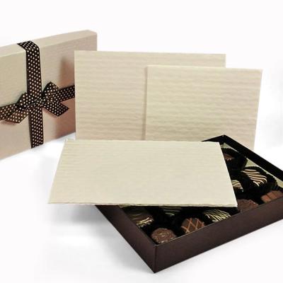 China Rectangle Black compressive Paper Cushion Pad For Chocolate Candy for sale