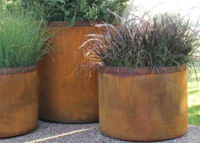 China Landscape Rusty Round Corten Steel Planters Boxes For Plaza Waterproof for sale