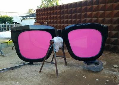 China Metal Sculpture Art Giant Sunglasses Sculpture Stainless Steel With Pink Glasses for sale