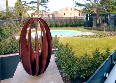 China Various Size Hollow Corten Steel Sculpture Rusty Metal Garden Ornament Egg Shaped for sale