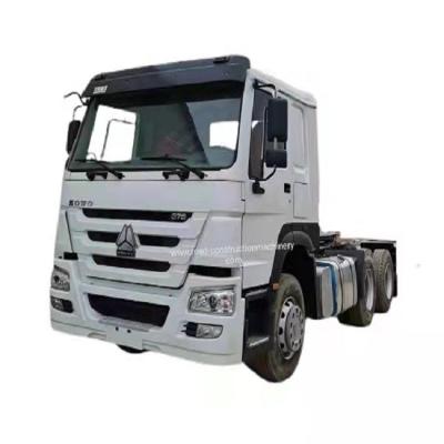 China cabeza del tractor de la mano de 375hp SINOTRUK HOWO segundo usada para transportar mercancías en África en venta