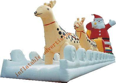 China La Navidad inflable Papá Noel con el reno del paseo hecho de la lona del PVC para la Navidad en venta