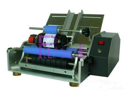 China Semi Automatic Industrial Bottle Labeling Machine For Wet Glue Paper Labels for sale