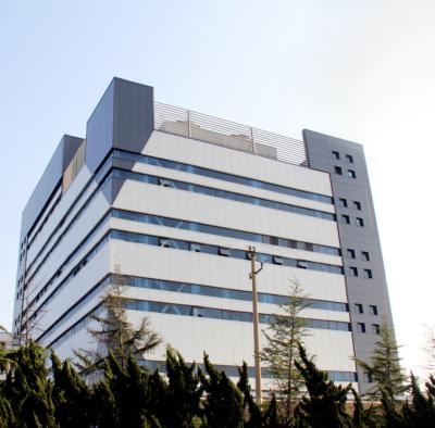 China Edifícios de aço pré-construídos contemporâneos Edifícios pré-fabricados de oficinas de metal Resistência sísmica à venda