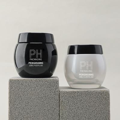 China Frasco de creme facial de alta qualidade do preto 30g 50g 120g do recipiente do frasco de creme de vidro com tampão à venda