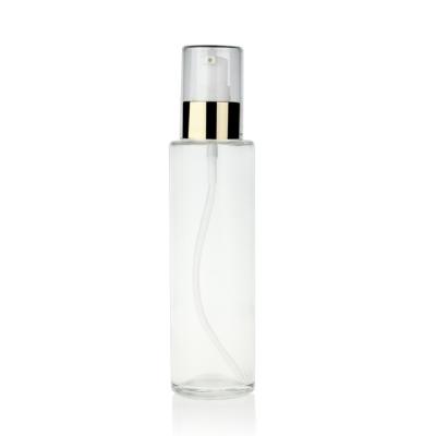 China Transparent 120ml Glass Lotion Bottles With Pump FDA Certificate Round Shape for sale