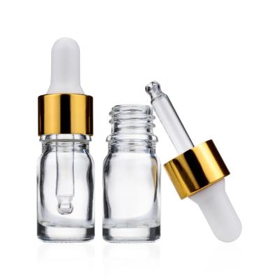 China Gold Dropper 5ml Oil Dropper Glass Bottle Transparent For Personal Care for sale