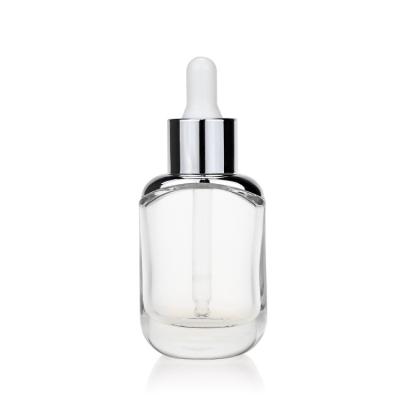China Skincare Package Serum Dropper Bottles Round 1 Oz Clear Glass Dropper Bottles for sale
