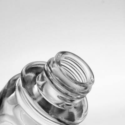 Китай Косметическое упаковывая 30ml вокруг ясной бутылки стекла учреждения лосьона сыворотки с насосом продается