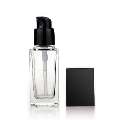 China Empty 35ml Square Cosmetic Glass Bottle Frosted Makeup Liquid Foundation Pump Bottle for sale