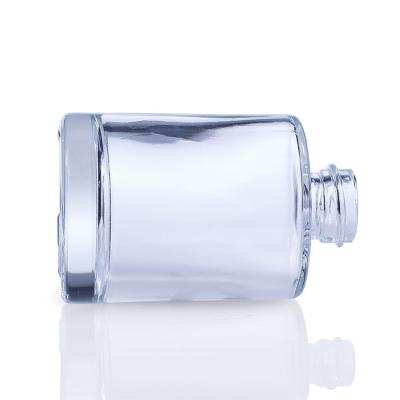 China botella de vidrio cosmética de la fundación del cuadrado claro de lujo 30ml con el espray F012 de la bomba en venta