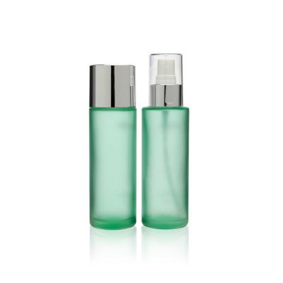 China Cosmetic Round 100ml Glass Spray Bottle With Aluminum Ream Container for sale