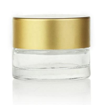 China 3ml 15ml 20ml Cosmetic Cream Jar Glass Clear With Gold Lids for sale
