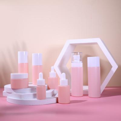 China 30ml 20ml 15ml Pink Cosmetic Glass Bottle Set Glass Dropper Bottle for sale