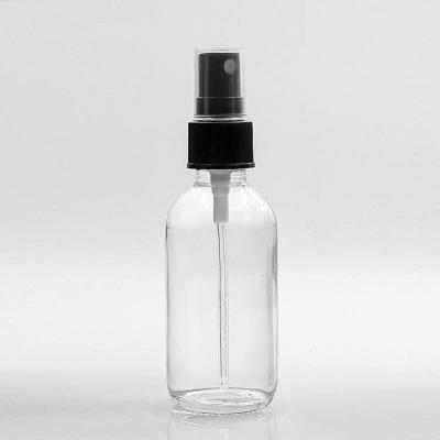 China Liquid 120ml Clear Boston Glass Bottles With Pump Spray for sale
