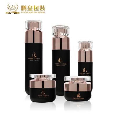 China La crema de cara cosmética de cristal de la botella fijó la botella de vidrio de la bomba de la loción de Skincare en venta