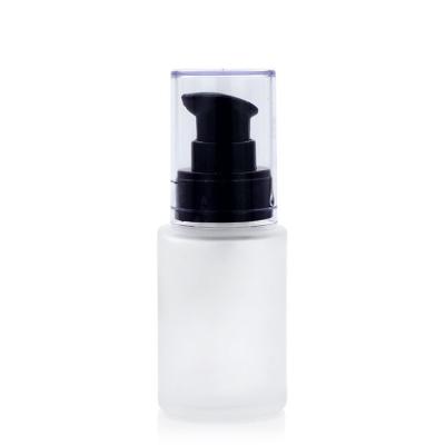 China Glass Empty Foundation Bottle Round Shape 30ml With Press Pump for sale